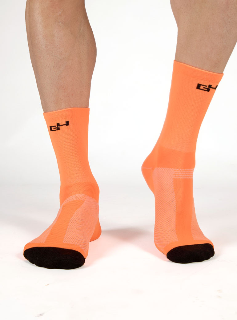 chaussettes de vélo orange fluo